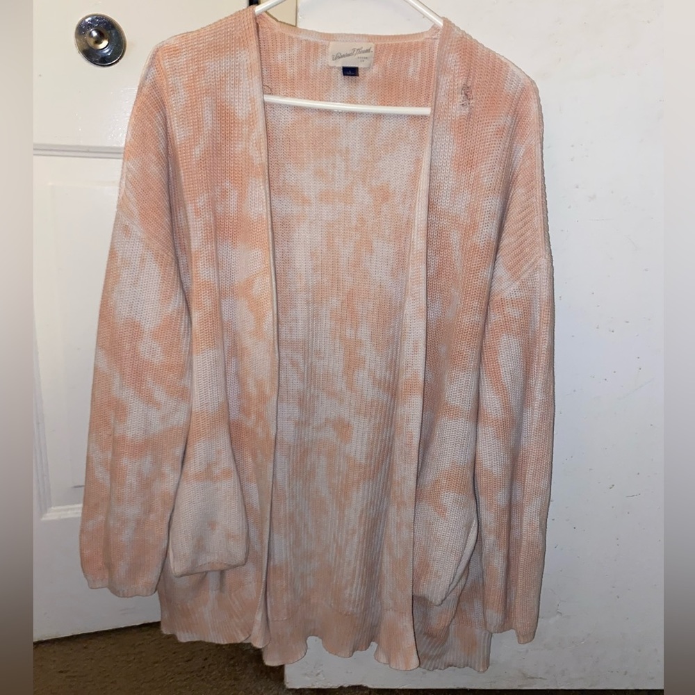 Pink and white knitted cardigan